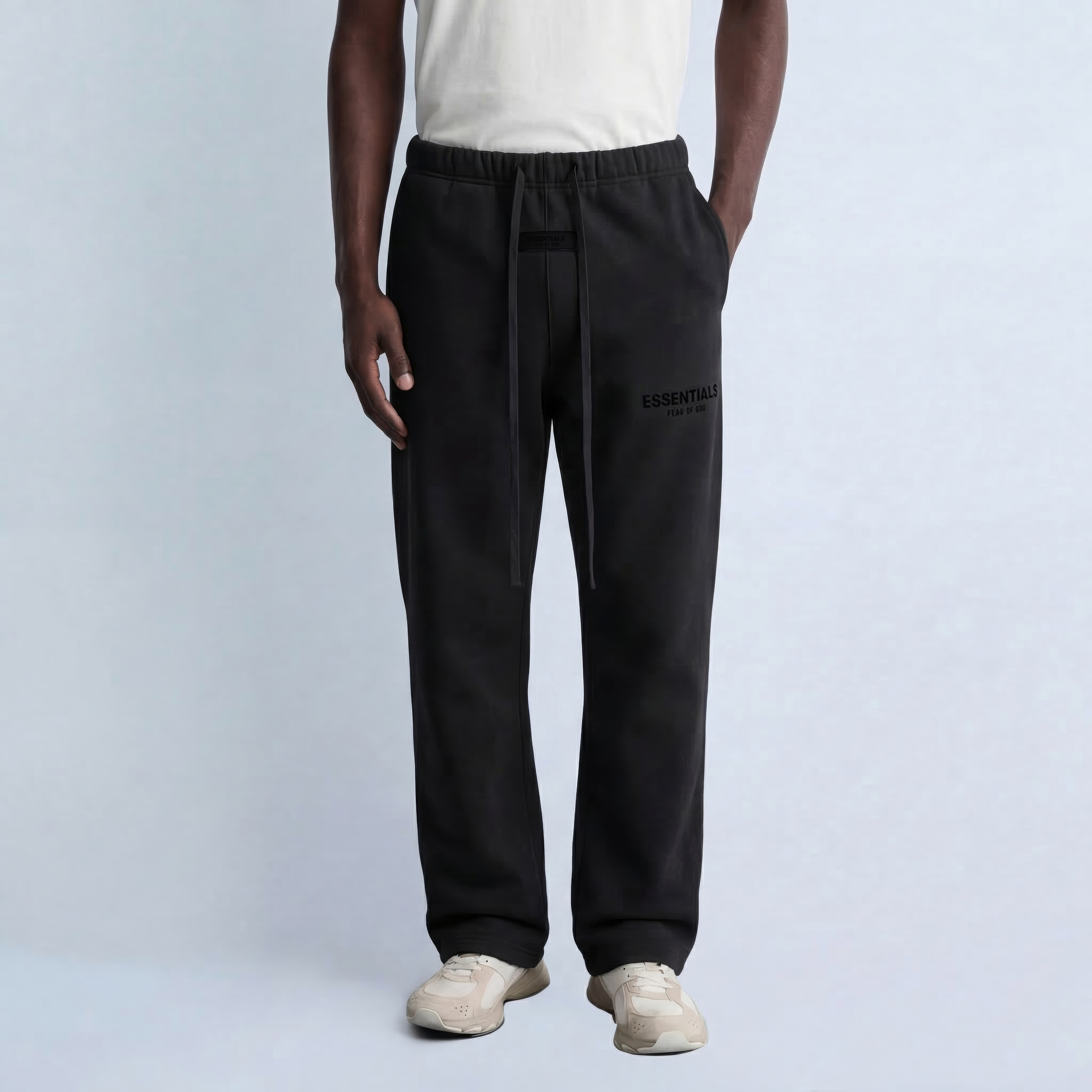 Model wearing relaxed essentials stretch limo sweatpatns