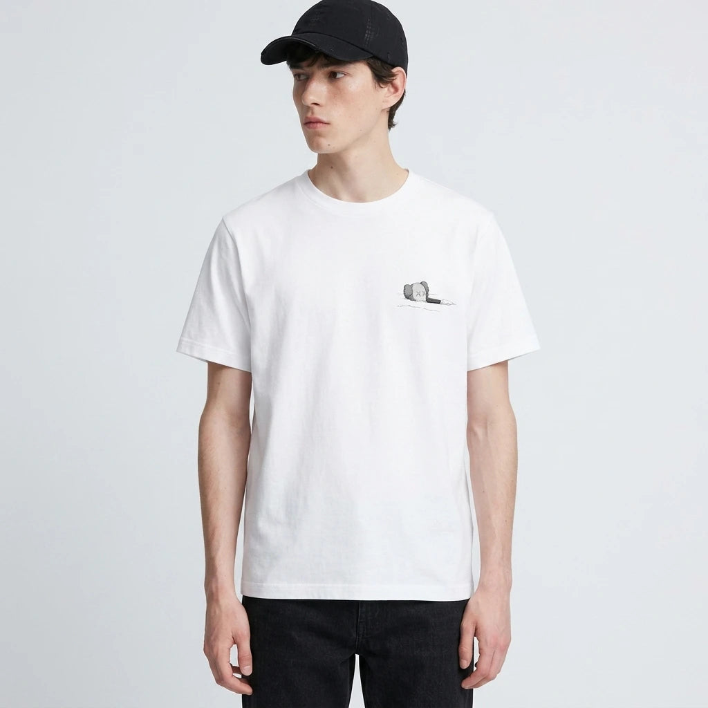 KAWS x Uniqlo T-Shirt Artbook Cover
