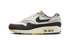 Nike Air Max 1 Athletic Department Light Bone University Gold, White/Black Forest-Neutral Grey-Varsity Maize (FN7487-133)